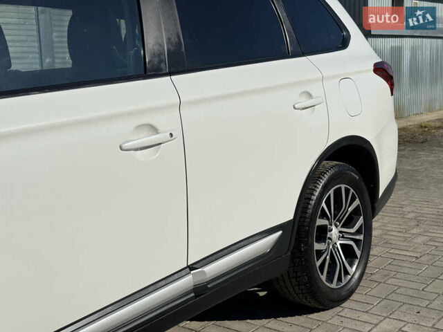 Білий Міцубісі Аутлендер, об'ємом двигуна 2.4 л та пробігом 178 тис. км за 12750 $, фото 23 на Automoto.ua