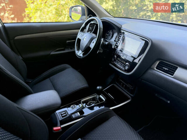 Белый Мицубиси Аутлендер, объемом двигателя 2.2 л и пробегом 240 тыс. км за 17999 $, фото 38 на Automoto.ua