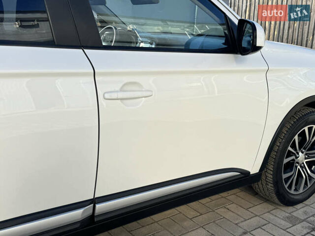 Білий Міцубісі Аутлендер, об'ємом двигуна 2.4 л та пробігом 178 тис. км за 12750 $, фото 33 на Automoto.ua