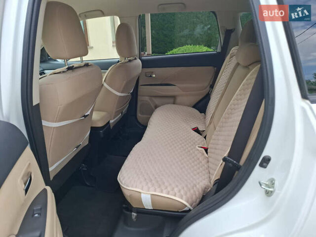 Белый Мицубиси Аутлендер, объемом двигателя 2.4 л и пробегом 145 тыс. км за 14900 $, фото 10 на Automoto.ua