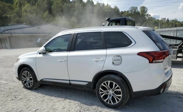 Білий Міцубісі Аутлендер, об'ємом двигуна 3 л та пробігом 177 тис. км за 8900 $, фото 6 на Automoto.ua