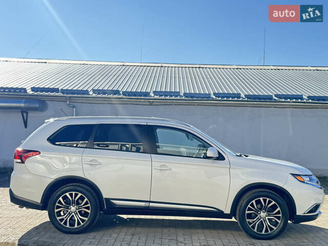 Білий Міцубісі Аутлендер, об'ємом двигуна 2.4 л та пробігом 178 тис. км за 12750 $, фото 12 на Automoto.ua