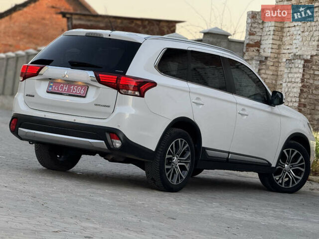Білий Міцубісі Аутлендер, об'ємом двигуна 2.23 л та пробігом 215 тис. км за 17550 $, фото 22 на Automoto.ua