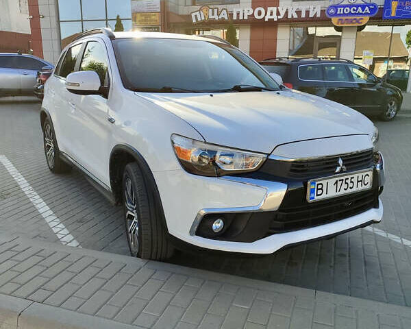 Білий Міцубісі Аутлендер, об'ємом двигуна 2.36 л та пробігом 133 тис. км за 13900 $, фото 1 на Automoto.ua