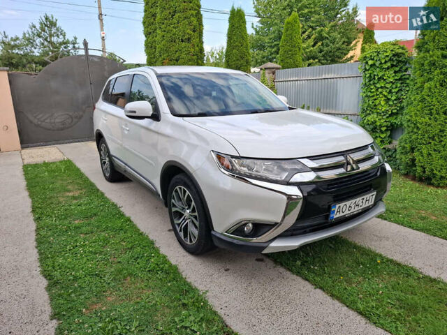 Белый Мицубиси Аутлендер, объемом двигателя 2.4 л и пробегом 145 тыс. км за 14900 $, фото 3 на Automoto.ua