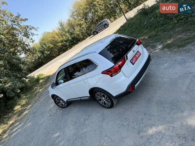 Белый Мицубиси Аутлендер, объемом двигателя 2.2 л и пробегом 240 тыс. км за 17999 $, фото 3 на Automoto.ua