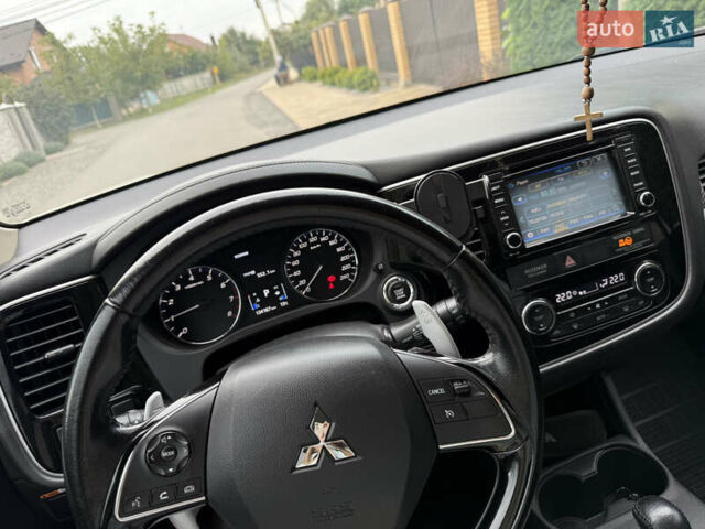 Белый Мицубиси Аутлендер, объемом двигателя 2.36 л и пробегом 134 тыс. км за 18500 $, фото 15 на Automoto.ua
