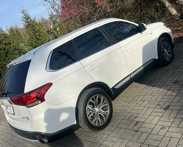 Білий Міцубісі Аутлендер, об'ємом двигуна 3 л та пробігом 157 тис. км за 16900 $, фото 21 на Automoto.ua