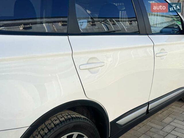Білий Міцубісі Аутлендер, об'ємом двигуна 2.4 л та пробігом 178 тис. км за 12750 $, фото 32 на Automoto.ua
