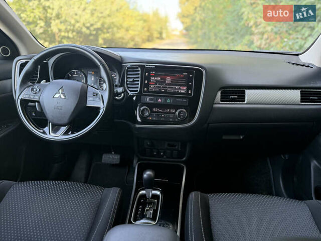 Білий Міцубісі Аутлендер, об'ємом двигуна 2.2 л та пробігом 240 тис. км за 18999 $, фото 35 на Automoto.ua
