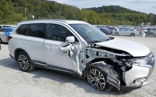 Білий Міцубісі Аутлендер, об'ємом двигуна 3 л та пробігом 177 тис. км за 8900 $, фото 9 на Automoto.ua