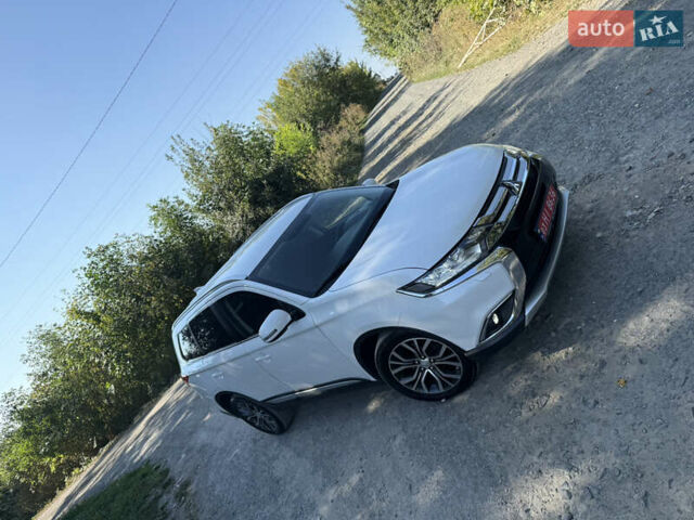 Белый Мицубиси Аутлендер, объемом двигателя 2.2 л и пробегом 240 тыс. км за 17999 $, фото 55 на Automoto.ua