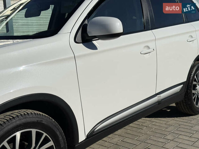 Білий Міцубісі Аутлендер, об'ємом двигуна 2.4 л та пробігом 178 тис. км за 12750 $, фото 22 на Automoto.ua