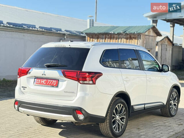 Білий Міцубісі Аутлендер, об'ємом двигуна 2.4 л та пробігом 178 тис. км за 12750 $, фото 9 на Automoto.ua