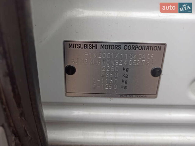 Білий Міцубісі Аутлендер, об'ємом двигуна 2.23 л та пробігом 215 тис. км за 17550 $, фото 90 на Automoto.ua