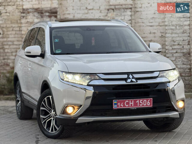 Білий Міцубісі Аутлендер, об'ємом двигуна 2.23 л та пробігом 215 тис. км за 17550 $, фото 13 на Automoto.ua