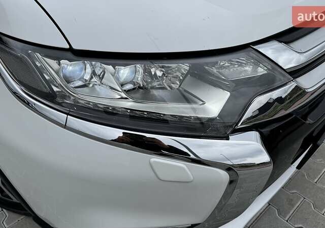 Белый Мицубиси Аутлендер, объемом двигателя 2.2 л и пробегом 199 тыс. км за 17999 $, фото 11 на Automoto.ua