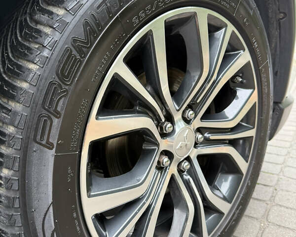 Білий Міцубісі Аутлендер, об'ємом двигуна 2.23 л та пробігом 215 тис. км за 17550 $, фото 87 на Automoto.ua