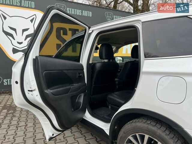 Белый Мицубиси Аутлендер, объемом двигателя 2.36 л и пробегом 153 тыс. км за 15700 $, фото 31 на Automoto.ua