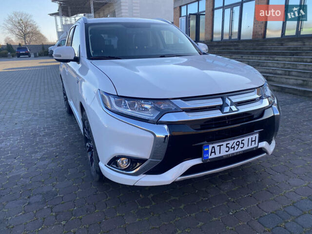 Белый Мицубиси Аутлендер, объемом двигателя 2 л и пробегом 109 тыс. км за 16999 $, фото 10 на Automoto.ua
