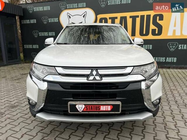 Белый Мицубиси Аутлендер, объемом двигателя 2.36 л и пробегом 153 тыс. км за 15700 $, фото 1 на Automoto.ua