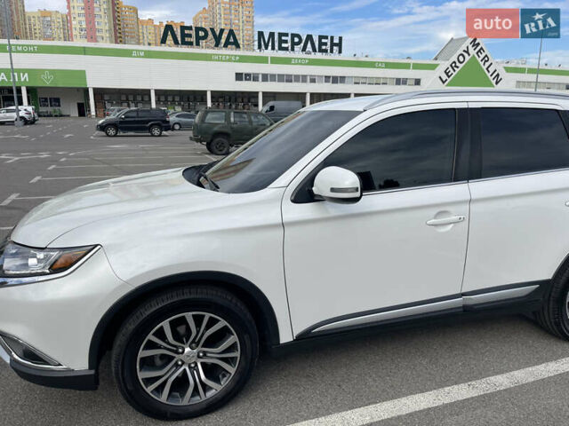 Белый Мицубиси Аутлендер, объемом двигателя 2.36 л и пробегом 136 тыс. км за 18500 $, фото 11 на Automoto.ua
