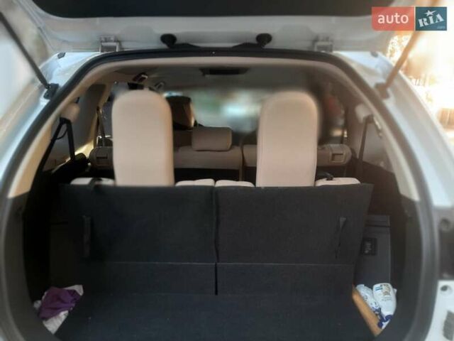 Белый Мицубиси Аутлендер, объемом двигателя 2.36 л и пробегом 90 тыс. км за 15500 $, фото 10 на Automoto.ua