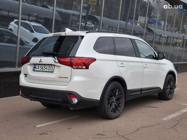 Белый Мицубиси Аутлендер, объемом двигателя 2.4 л и пробегом 115 тыс. км за 19300 $, фото 3 на Automoto.ua