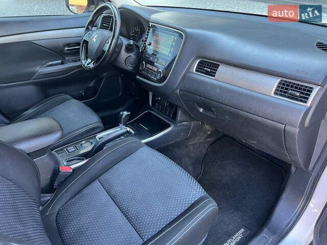 Белый Мицубиси Аутлендер, объемом двигателя 2.4 л и пробегом 210 тыс. км за 13550 $, фото 13 на Automoto.ua