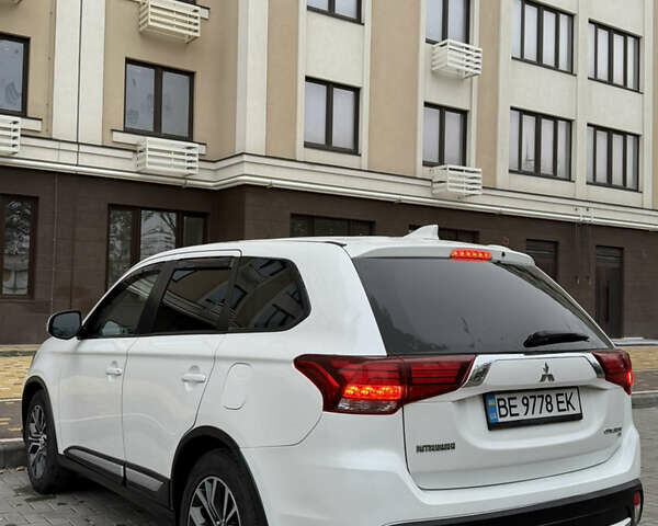 Белый Мицубиси Аутлендер, объемом двигателя 2.4 л и пробегом 53 тыс. км за 16900 $, фото 7 на Automoto.ua