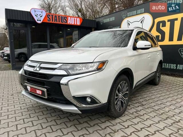 Белый Мицубиси Аутлендер, объемом двигателя 2.36 л и пробегом 153 тыс. км за 15700 $, фото 3 на Automoto.ua