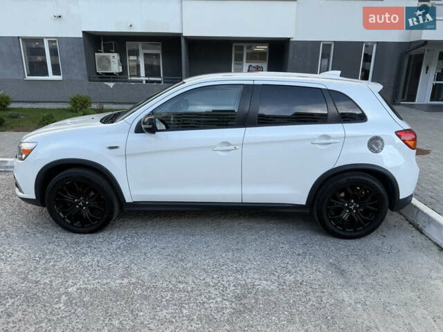 Белый Мицубиси Аутлендер, объемом двигателя 2 л и пробегом 133 тыс. км за 13000 $, фото 11 на Automoto.ua