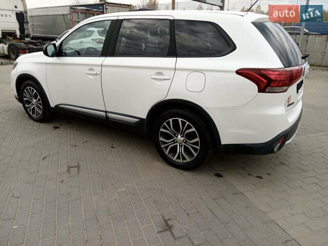 Белый Мицубиси Аутлендер, объемом двигателя 2.4 л и пробегом 225 тыс. км за 10999 $, фото 9 на Automoto.ua