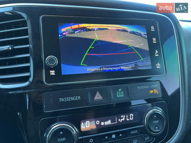 Белый Мицубиси Аутлендер, объемом двигателя 2.4 л и пробегом 210 тыс. км за 13550 $, фото 14 на Automoto.ua