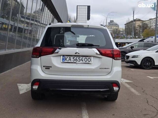 Белый Мицубиси Аутлендер, объемом двигателя 2.4 л и пробегом 115 тыс. км за 19300 $, фото 5 на Automoto.ua