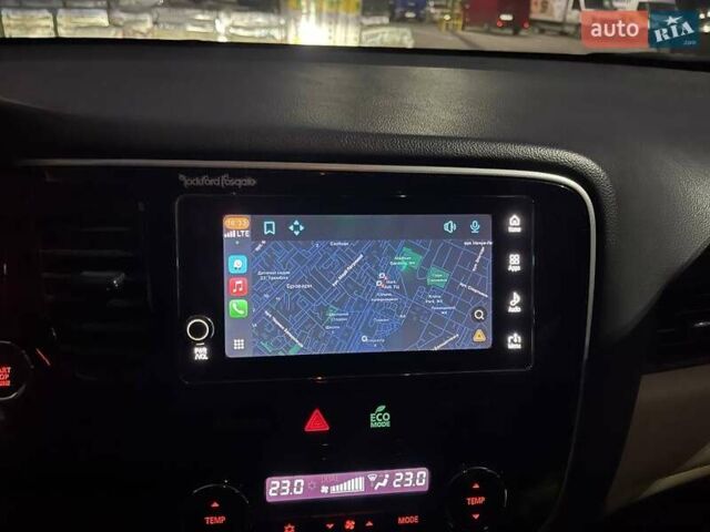 Белый Мицубиси Аутлендер, объемом двигателя 3 л и пробегом 148 тыс. км за 18500 $, фото 34 на Automoto.ua