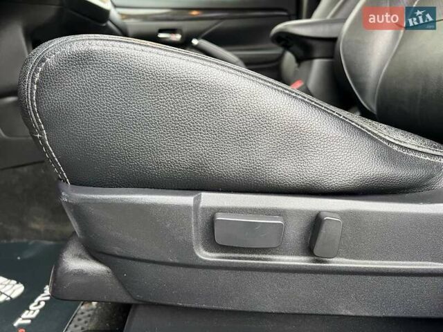 Белый Мицубиси Аутлендер, объемом двигателя 2.36 л и пробегом 153 тыс. км за 15700 $, фото 17 на Automoto.ua