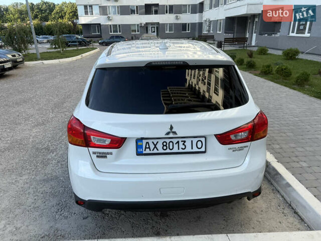 Белый Мицубиси Аутлендер, объемом двигателя 2 л и пробегом 133 тыс. км за 13000 $, фото 13 на Automoto.ua