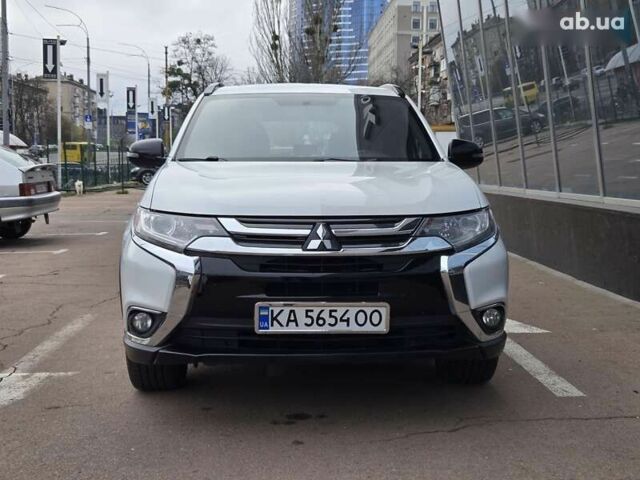 Белый Мицубиси Аутлендер, объемом двигателя 2.4 л и пробегом 115 тыс. км за 19300 $, фото 2 на Automoto.ua