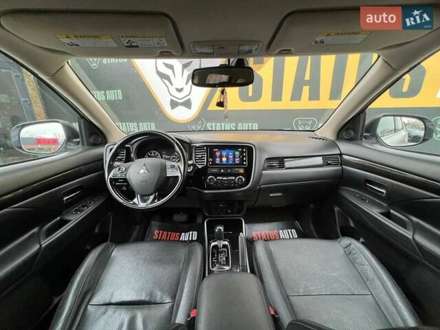 Белый Мицубиси Аутлендер, объемом двигателя 2.36 л и пробегом 153 тыс. км за 15700 $, фото 33 на Automoto.ua