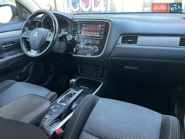 Белый Мицубиси Аутлендер, объемом двигателя 2.4 л и пробегом 210 тыс. км за 13550 $, фото 7 на Automoto.ua