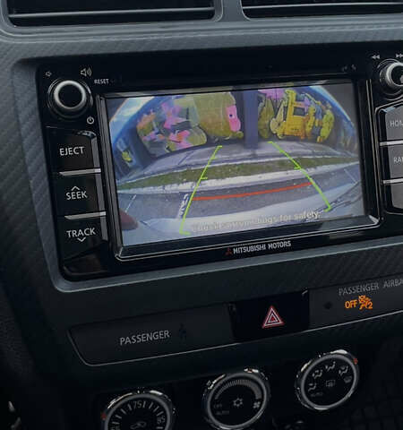 Білий Міцубісі Аутлендер, об'ємом двигуна 2 л та пробігом 47 тис. км за 13700 $, фото 14 на Automoto.ua