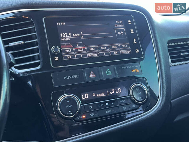 Белый Мицубиси Аутлендер, объемом двигателя 2.4 л и пробегом 210 тыс. км за 13550 $, фото 12 на Automoto.ua