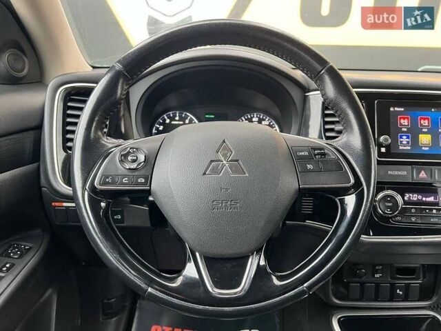 Белый Мицубиси Аутлендер, объемом двигателя 2.36 л и пробегом 153 тыс. км за 15700 $, фото 20 на Automoto.ua