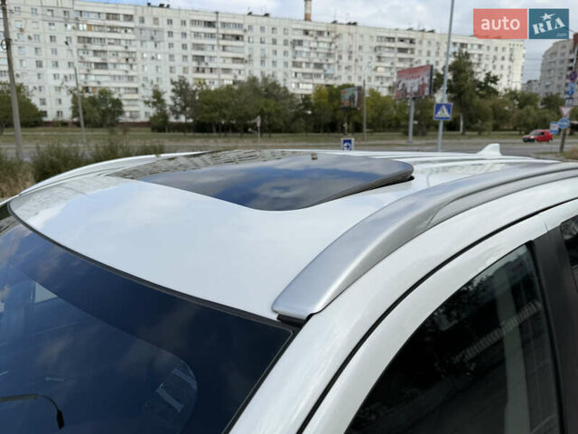 Білий Міцубісі Аутлендер, об'ємом двигуна 2 л та пробігом 225 тис. км за 18900 $, фото 32 на Automoto.ua