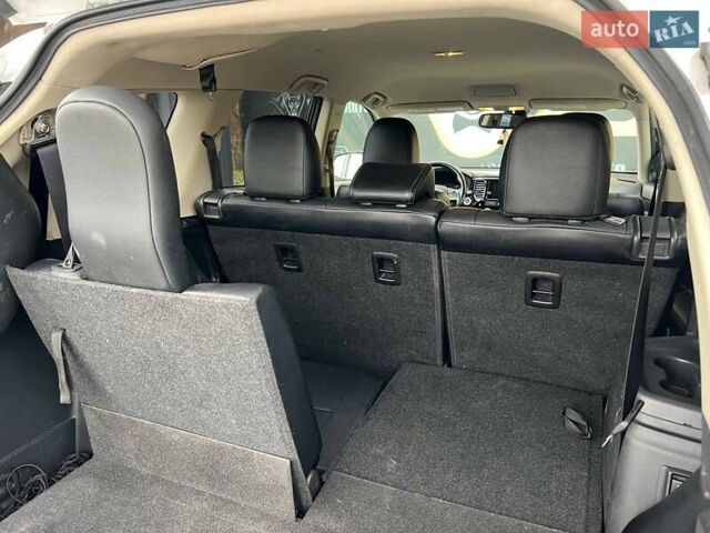 Белый Мицубиси Аутлендер, объемом двигателя 2.36 л и пробегом 153 тыс. км за 15700 $, фото 11 на Automoto.ua