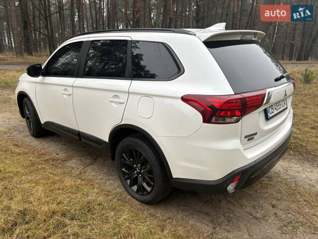 Білий Міцубісі Аутлендер, об'ємом двигуна 2.4 л та пробігом 130 тис. км за 16200 $, фото 2 на Automoto.ua