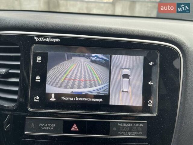 Белый Мицубиси Аутлендер, объемом двигателя 2.36 л и пробегом 112 тыс. км за 21500 $, фото 23 на Automoto.ua