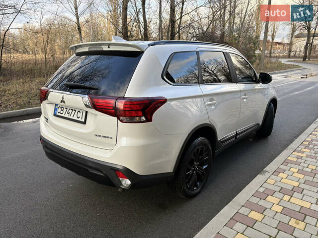 Білий Міцубісі Аутлендер, об'ємом двигуна 2.4 л та пробігом 130 тис. км за 15700 $, фото 3 на Automoto.ua