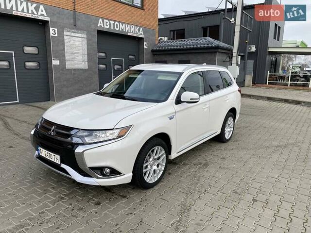 Білий Міцубісі Аутлендер, об'ємом двигуна 2 л та пробігом 118 тис. км за 17800 $, фото 63 на Automoto.ua